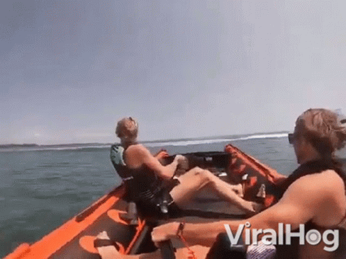 Man And Woman Sitting In Boat GIF