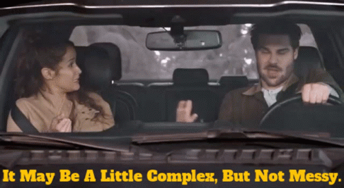 Man and Woman Sitting in Car