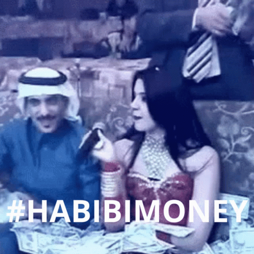 Man and Woman Sitting in Front of Pile of Money #habibimoney