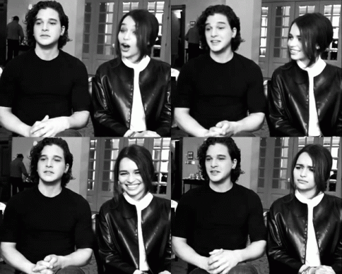Man and Woman Sitting Next to Each Other