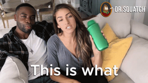 Man and Woman Sitting on Couch
