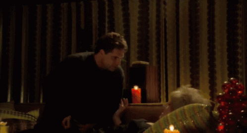 Man and Woman Sitting on Couch Leftover From Husband
