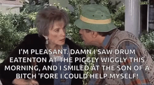 Man and Woman Sitting on Porch Talking