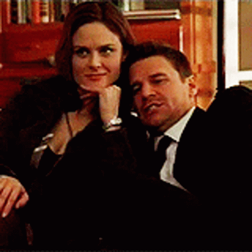 Man and Woman Sitting Together