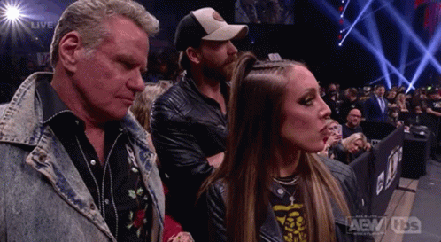 Man And Woman Standing Beside In Stadium GIF