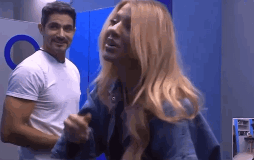 Man And Woman Standing In Bathroom GIF