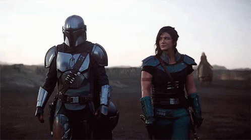 Man and Woman Standing in Desert