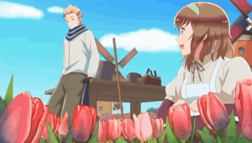 Man and Woman Standing in Field of Flowers
