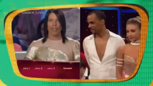 Man And Woman Standing In Front Of Jury 1 Screen GIF