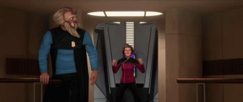 Man And Woman Standing In Hallway GIF