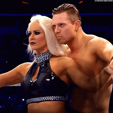 Man and Woman Standing in Ring