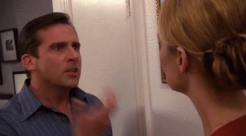 Man and Woman Standing in Room