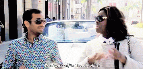 Man And Woman Standing Next To A White Car GIF