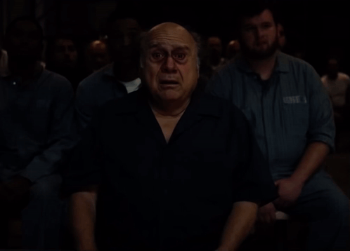Man And Woman Standing Next To Each Other In Room GIF
