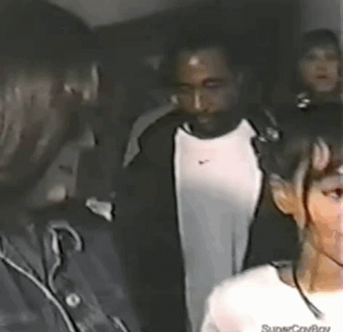 Man And Woman Standing Next To Each Other GIF