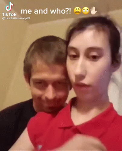 Man and Woman Standing Next to Each Other