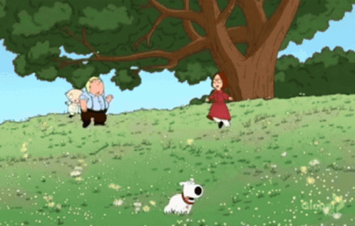 Man And Woman Standing Next To Tree GIF