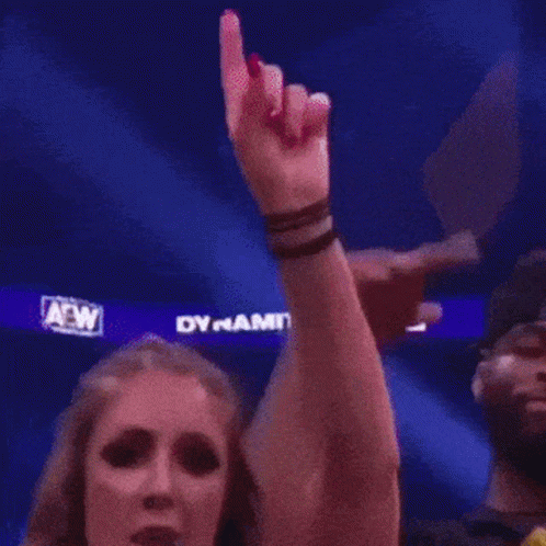 Man And Woman Standing Next To Woman In Pittsburgh Shirt GIF
