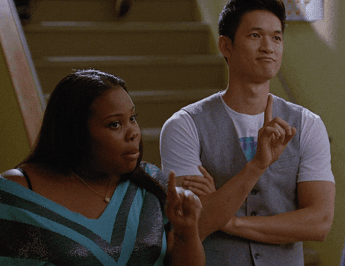 Man And Woman Standing On Stairs GIF