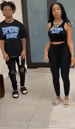 Man and Woman Standing on Tiled Floor