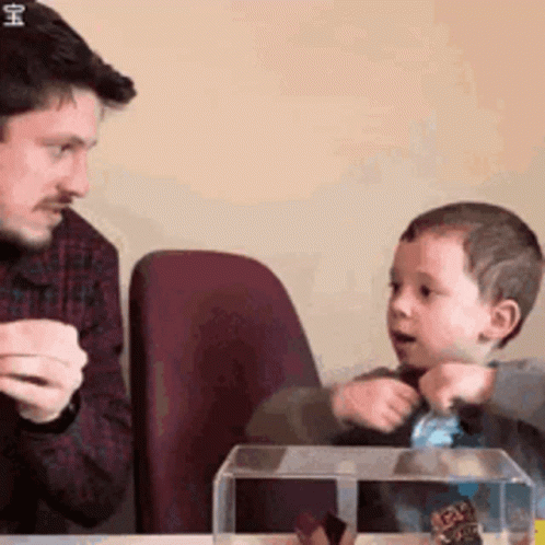 Man And Woman Standing Side By Side In Room GIF