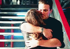 Man And Woman Standing Side By Side GIF