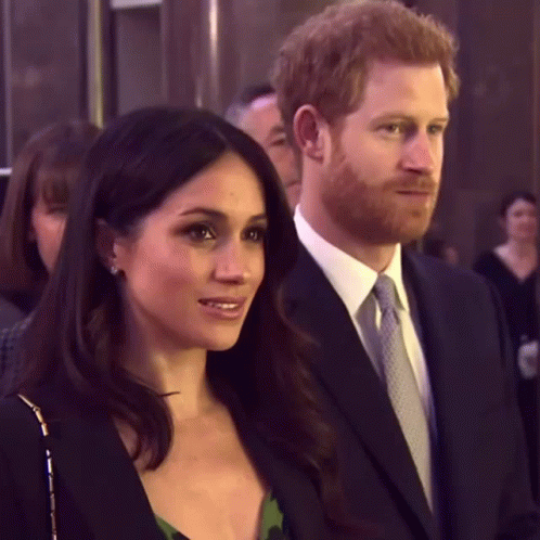 Man And Woman Standing Smiling GIF