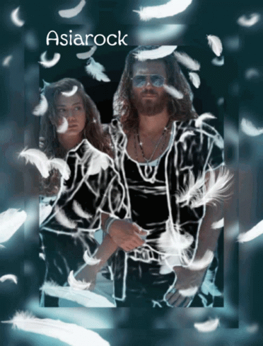 Man And Woman Surrounded By Feathers GIF