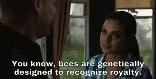 Man and Woman Talking About Bees Recognizing Royalty