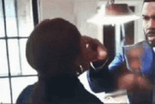 Man And Woman Talking By Window Woman With Hoop Earrings GIF