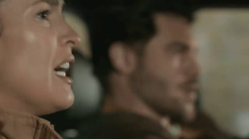 Man and Woman Talking in Car
