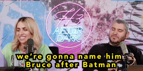 Man And Woman Talking Into Microphones In Front Of F3 After Dark Sign GIF