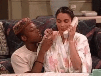 Man and Woman Talking on Cell Phone