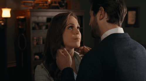 Man and Woman Touching Faces