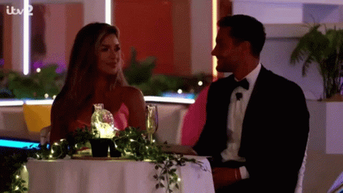 Man And Woman Walking Down Sidewalk GIF