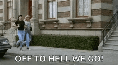 Man And Woman Walking Down Street GIF