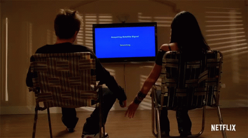 Man And Woman Watching Satellite Signal GIF