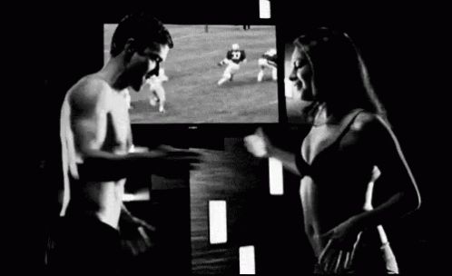Man And Woman Watching TV GIF