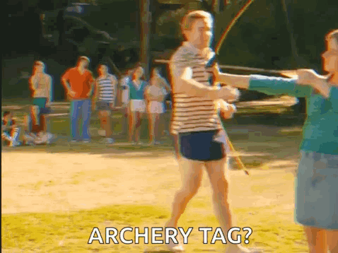 Man and Woman with Bows Saying Archery Tag