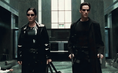 Man and Woman with Guns