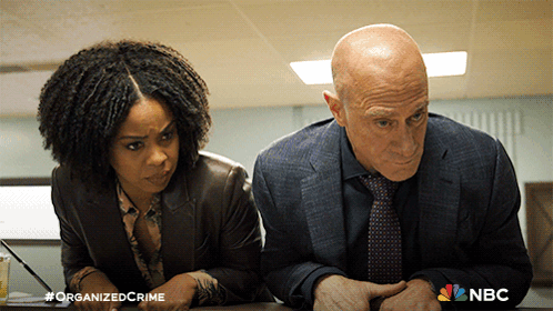 Man and Woman With Hashtag Organized Crime