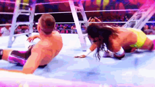 Man And Woman Wrestling In Ring GIF