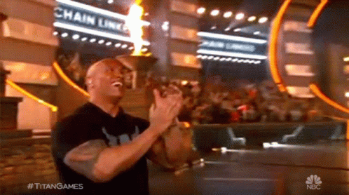 Man Applauding In Front Of Chain Link Sign GIF