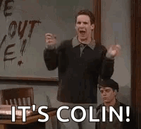 Man at Blackboard Saying It's Colin