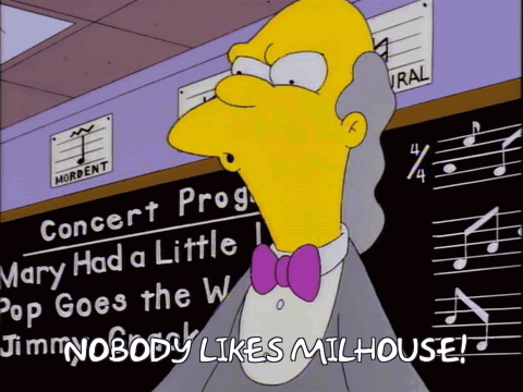 Man at Concert Program Sign