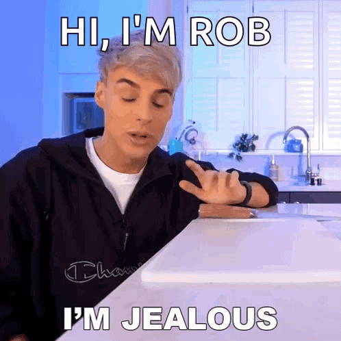 Man at Counter Saying Hi I'm Rob I'm Jealous