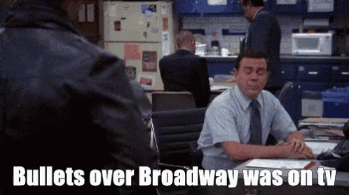 Man at Desk Bullets Over Broadway on TV