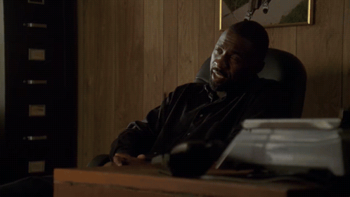 Man at Desk Saying And Y'all Givin' Me Way Too Many