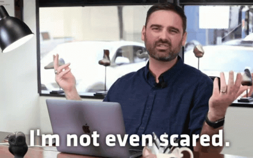Man at Desk Saying I'm Not Even Scared