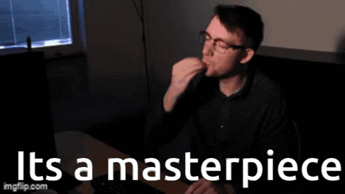 Man at Desk Saying It's a Masterpiece